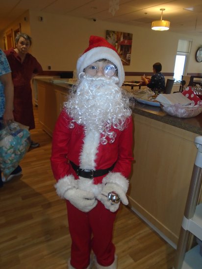 Jesse Dalling surprises the residents each winter as he dresses up as Santa Clause.jpg