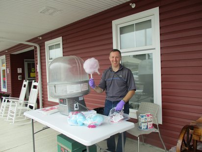 Our CEO, Dan Gilman, serving up Cotton Candy.jpg